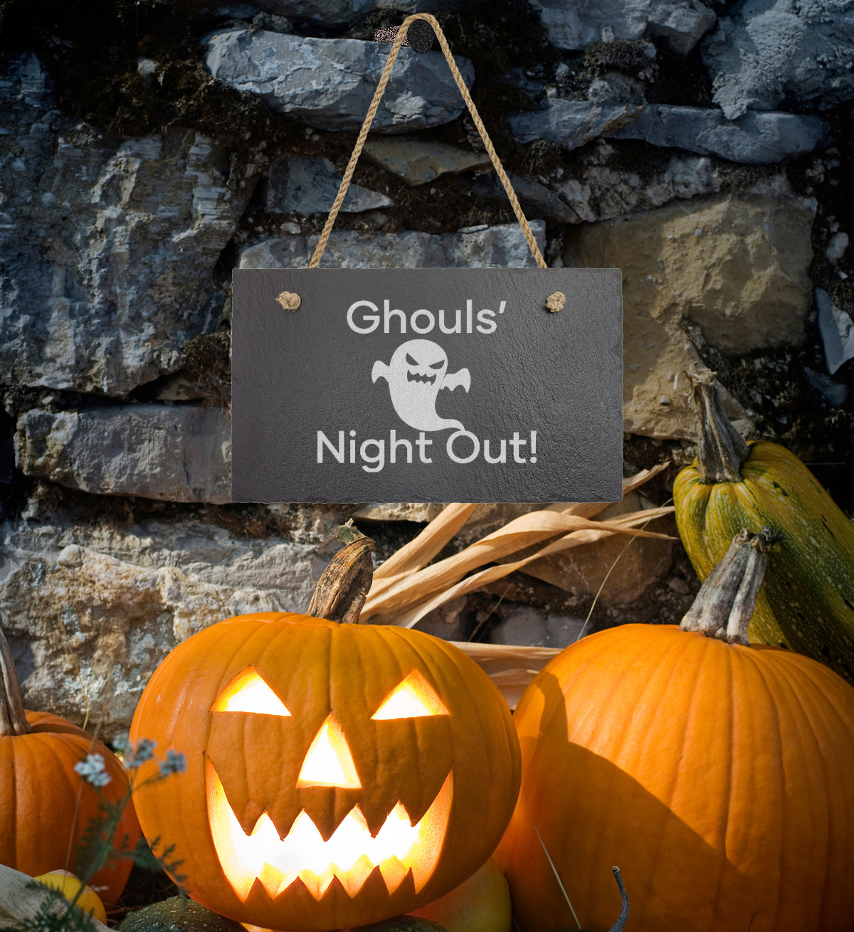 Ghouls Slate Sign Hanging on Stone